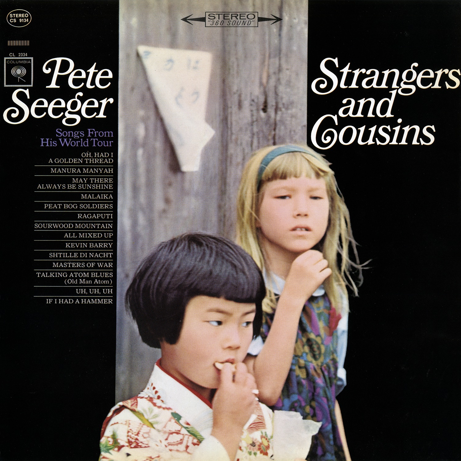Strangers and Cousins: Songs from His World Tour (Live) album cover